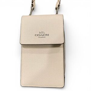 Coach North South Phone Crossbody in chalk polished pebble or crossgrain leather